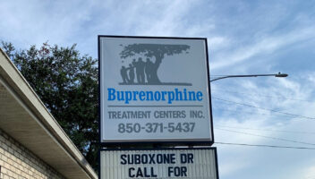 street sign that says buprenorphine treatment centers call for appointment