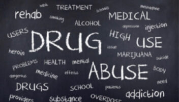 chalk board that says drug abuse along with various other words