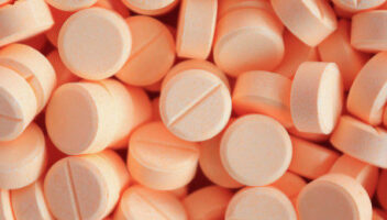 orange circular pills