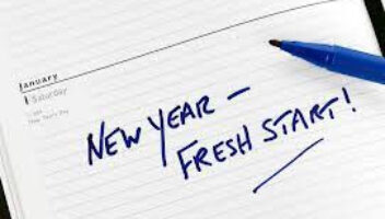 lined paper saying 'new year-fresh start'